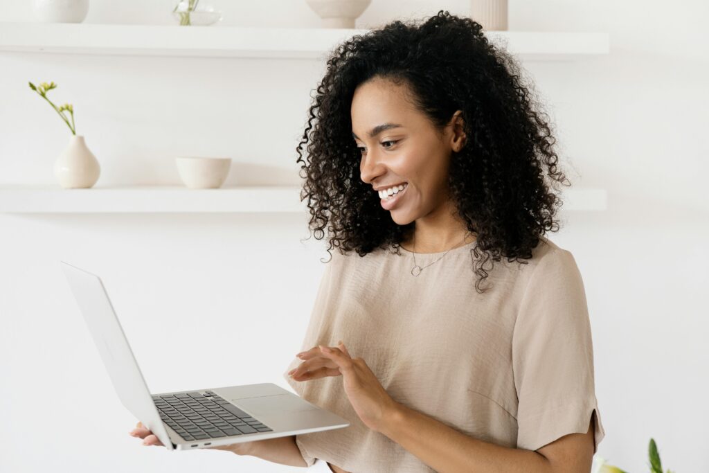 Woman using an ebook creator to help create passive income online